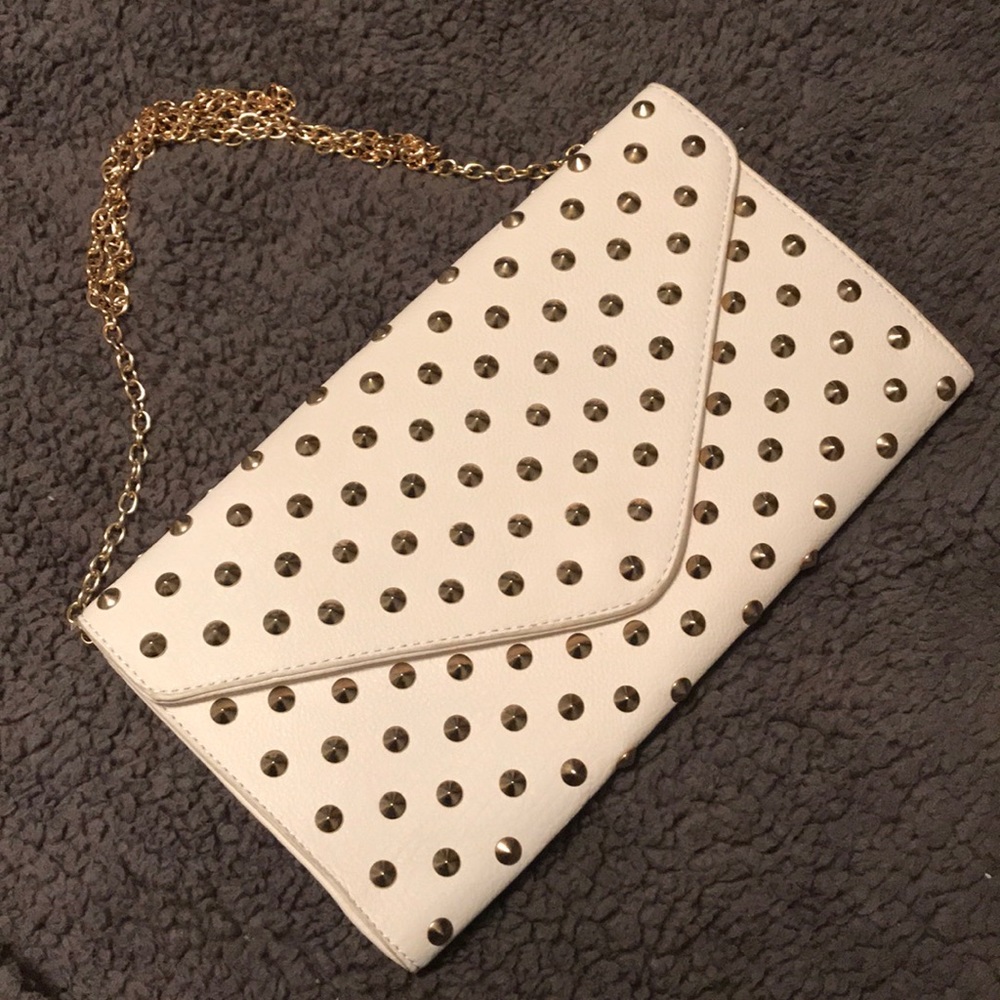 White over the shoulder gold studded purse